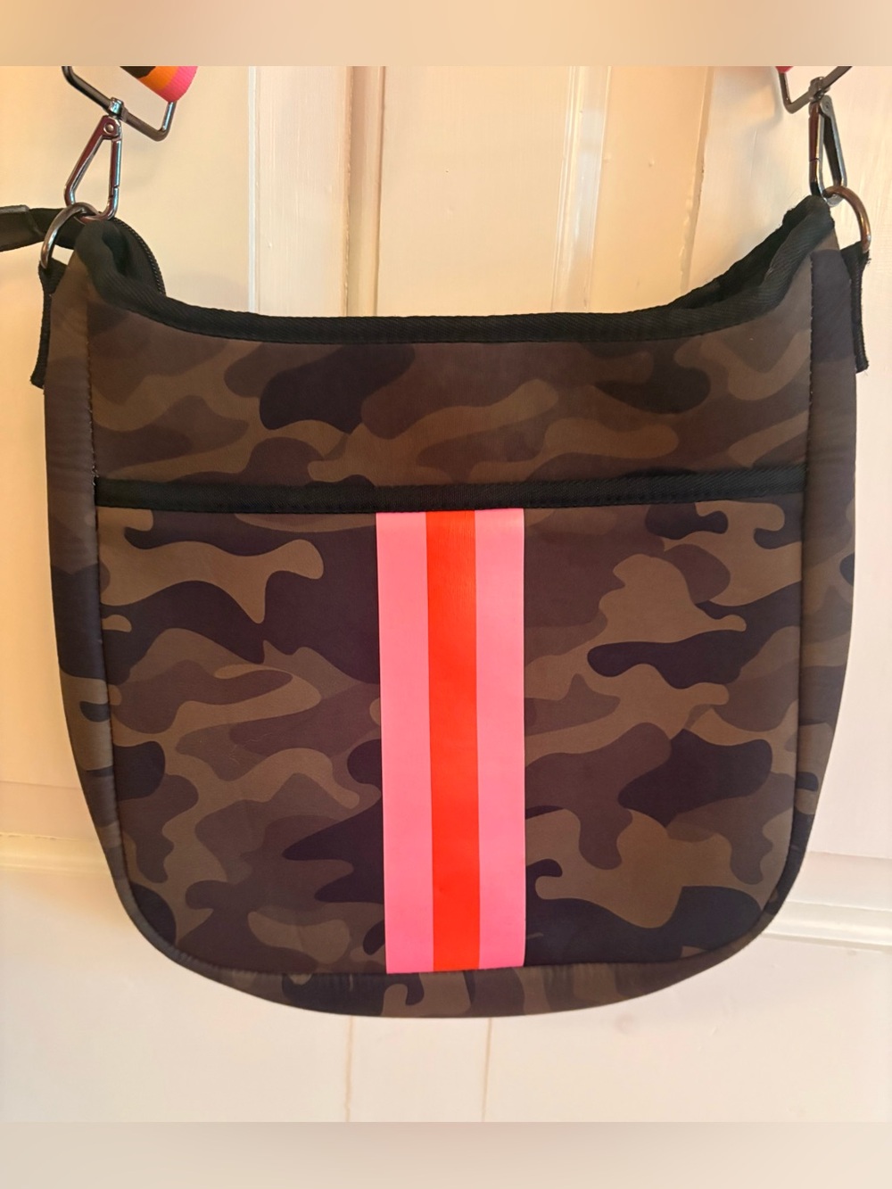 Haute Shore Neoprene Crossbody Camo Bag with pink/orange strap